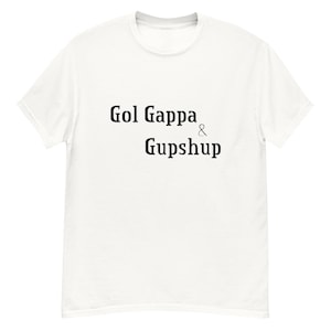 May include: White t-shirt with black text that reads "Gol Gappa & Gupshup".