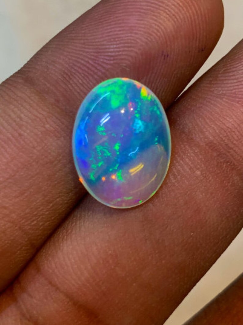 New Arrival Welo Ethiopian Beautiful Opal Top High Grade Quality Oval shape Smooth Polished Multi Fire Cabochon 11x15 mm height 6 mm image 6