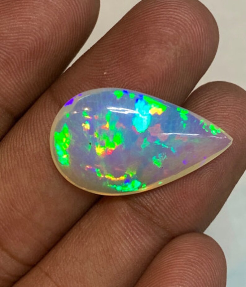 Opal Welo Ethiopian Opal Top Grade High Quality Full Flash Strong Fire Pear Shape Cabochon 16.5x26 mm-height 7 mm 13.50 ct fire opal image 3