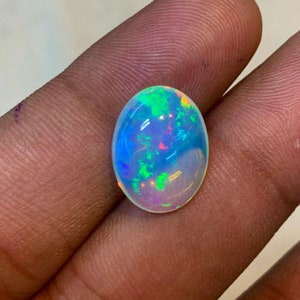 New Arrival Welo Ethiopian Beautiful Opal Top High Grade Quality Oval shape Smooth Polished Multi Fire Cabochon 11x15 mm height 6 mm image 7