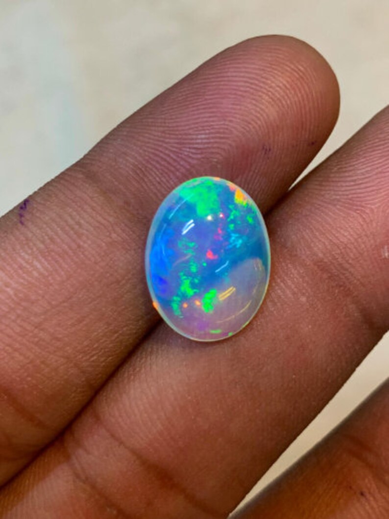 New Arrival Welo Ethiopian Beautiful Opal Top High Grade Quality Oval shape Smooth Polished Multi Fire Cabochon 11x15 mm height 6 mm image 7