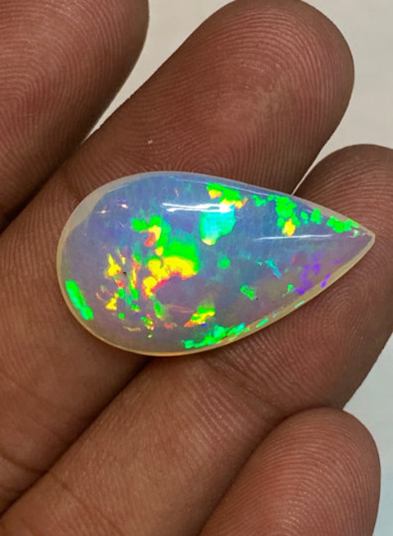 Opal Welo Ethiopian Opal Top Grade High Quality Full Flash Strong Fire Pear Shape Cabochon 16.5x26 mm-height 7 mm 13.50 ct fire opal image 5