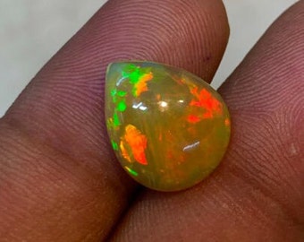 New Arrival Welo Ethiopian Beautiful Opal Pear Shape High Grade Quality  Smooth Polished Multi Fire Cabochon Size 12x14.50 mm height 4.50 mm