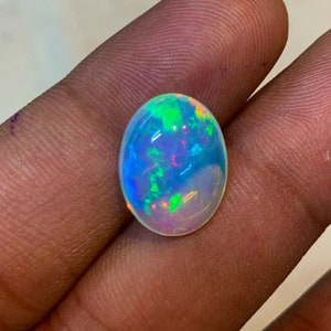 New Arrival Welo Ethiopian Beautiful Opal Top High Grade Quality Oval shape Smooth Polished Multi Fire Cabochon 11x15 mm height 6 mm image 8