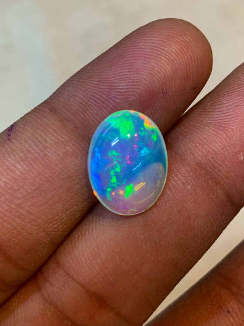 New Arrival Welo Ethiopian Beautiful Opal Top High Grade Quality Oval shape Smooth Polished Multi Fire Cabochon 11x15 mm height 6 mm image 8