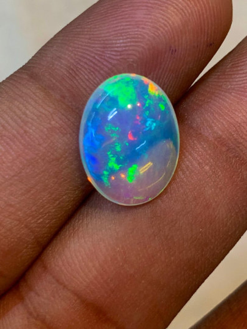 New Arrival Welo Ethiopian Beautiful Opal Top High Grade Quality Oval shape Smooth Polished Multi Fire Cabochon 11x15 mm height 6 mm image 9