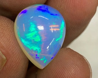 New Arrival Extraordinary Rare Top Quality Opal Stunning Flash Fire Pear Shape Natural Designer Collection For Sale  13x16 mm  height 10 mm