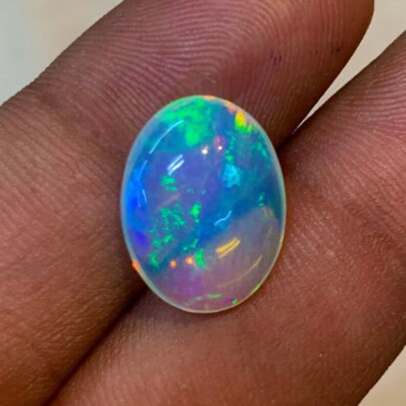 New Arrival Welo Ethiopian Beautiful Opal Top High Grade Quality Oval shape Smooth Polished Multi Fire Cabochon 11x15 mm height 6 mm image 1