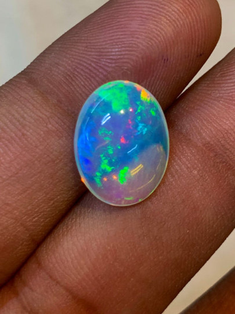 New Arrival Welo Ethiopian Beautiful Opal Top High Grade Quality Oval shape Smooth Polished Multi Fire Cabochon 11x15 mm height 6 mm image 4