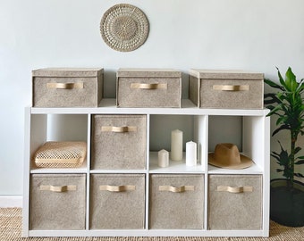 Set of three square baskets with lids