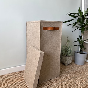 Tall narrow laundry hamper with lid. Felt rectangular hamper.