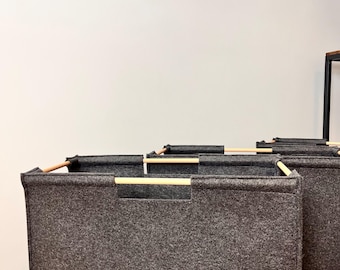 Under a bad bins. Set of 2 low square baskets  with wooden handles