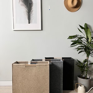Narrow laundry bin with lid