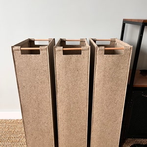 Set of four narrow hampers. Felt storage baskets