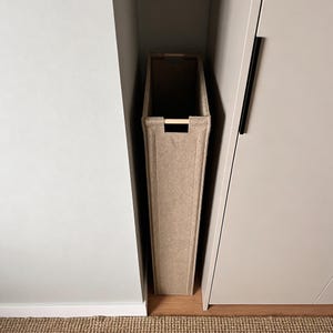 May include: A set of three ceramic mugs with a speckled, matte finish. Each mug features a different color: light blue, cream, and gray. The mugs have a simple, modern design and a comfortable handle.