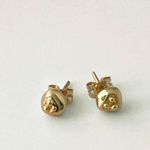 Tiny Gold earrings in solid gold. Enduring, individual and precious Mother's Day,birthday, anniversary or special gift for her.