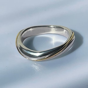 Modern Designer Wedding Band for Man, sculpted in Silver with Gold. "Full Circle". Unique, stylish, practical, alternative and comfortable.