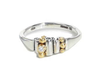 Contemporary Ring. Silver+18 kt Gold beads, very fine diamond.Artisan.Modern Designer Pamela Dickinson.Fine jewelry.Precious gift.