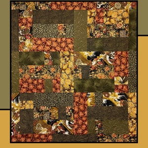 May include: A quilt pattern called "Egg Rolls" by Heidi Cook for Villa Rosa Designs. The quilt is made of various fabrics with floral and geometric patterns in shades of brown, gold, and red.
