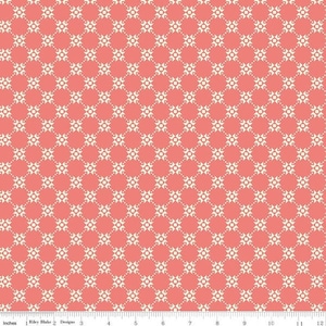 May include: A repeating pattern of white stars on a coral pink background. The stars are outlined in white dots.