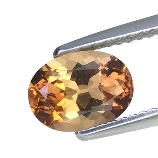 1.22 CTS  Orange brown natural scapolite oval  cut loose gemstones "see video "