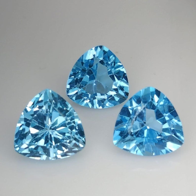 9.970 CTS sky blue natural TOPAZ trillion cut 3pcs loose gemstones see video