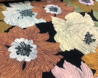 Viscose poplin fabric printed with large autumnal flowers on a black background - 25 cm
