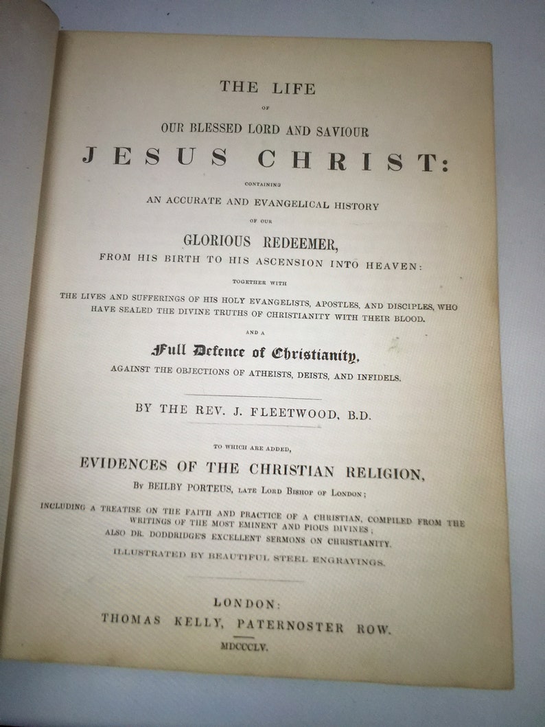 May include: A vintage book cover with the title "The Life of Our Blessed Lord and Saviour Jesus Christ". The book contains an accurate and evangelical history of Jesus Christ, including his birth, ascension into heaven, and a full defense of Christianity. The book was written by the Rev. J. Fleetwood, B.D. and published in 1855.
