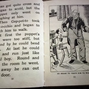 May include: An open book with illustrations and text. The right page shows a black and white drawing of a man teaching a wooden puppet to walk. The text reads "HE BEGAN TO TEACH HIM TO WALK".