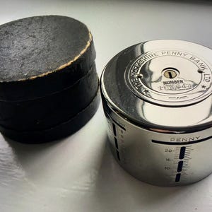 Vintage The YORKSHIRE PENNY BANK round chrome home safe money box - in original box - 1920s