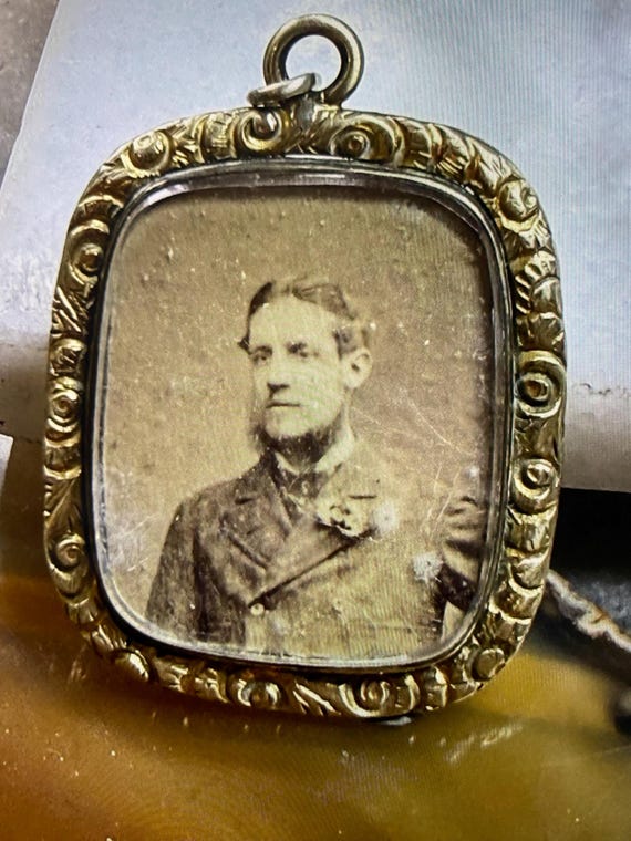Antique Victorian Rolled Gold Pendant/Locket featuring original Victorian photos