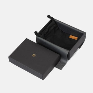 premium sustainable packaging for AirTAg wallets made by Geometric Goods