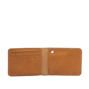 The Dollar Bill AirTag Wallet with hidden pocket to fit inside Apple's AirTag, handcrafted from premium Italian leather image 2