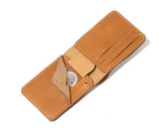 The Dollar Bill AirTag Wallet with hidden pocket to fit inside Apple's AirTag, handcrafted from premium Italian leather