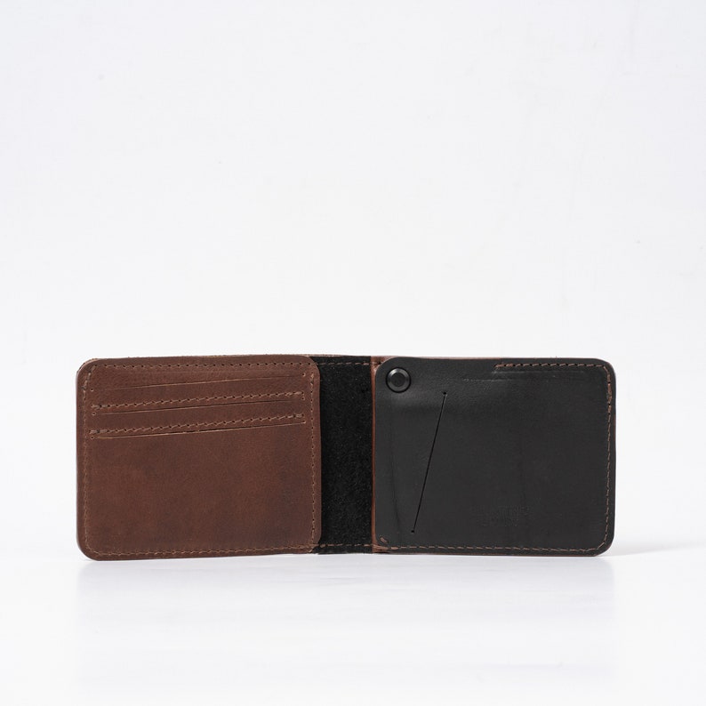 The Dollar Bill AirTag Wallet with hidden pocket to fit inside Apple's AirTag, handcrafted from premium Italian leather Mahogany & Black