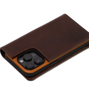 iPhone folio case wallet made from premium Italian leather in dark brown color with strong MagSafe attachment
