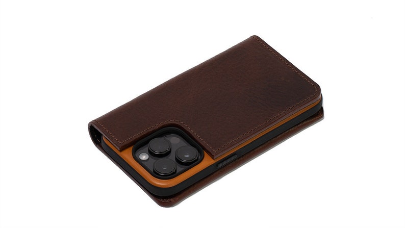 iPhone folio case wallet made from premium Italian leather in dark brown color with strong MagSafe attachment