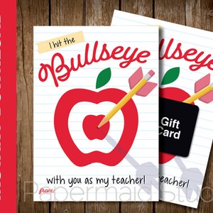 May include: A printable teacher appreciation card with a red apple target and an arrow through the bullseye. The text reads "I hit the bullseye with you as my teacher!" and "Gift Card".
