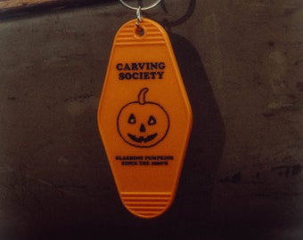 Carving Society - cabin key fob (orange/hand numbered)