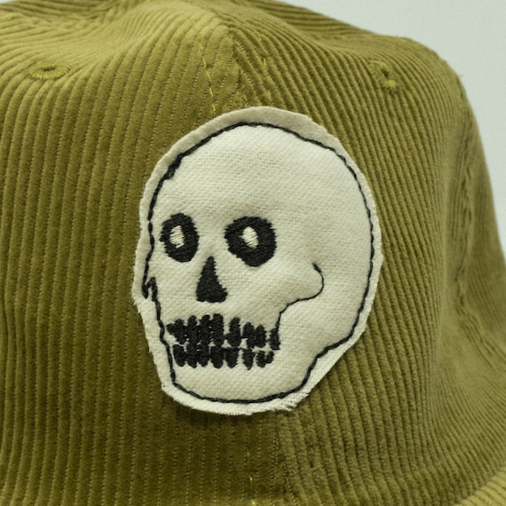 Olive Corduroy Cloth Skull hand cut cap