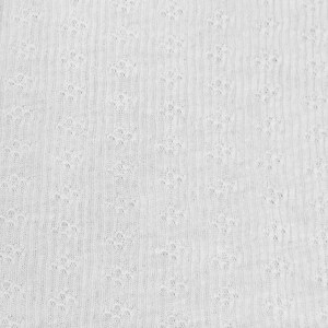 May include: White knitted fabric with a textured pattern. The fabric has a soft, delicate look and feel.