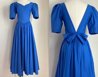 1980s Laura Ashley Cobalt Blue Cotton Sweetheart Puff Sleeve Gown Deep V Open Back Bow Detail Midi Dress with Pockets