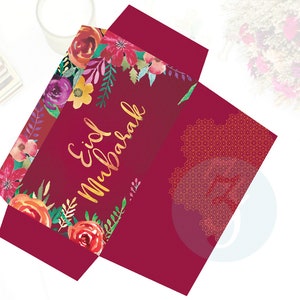 Puede incluir: Sobre rojo con un dise&ntilde;o floral y el texto "Eid Mubarak" en letras doradas.