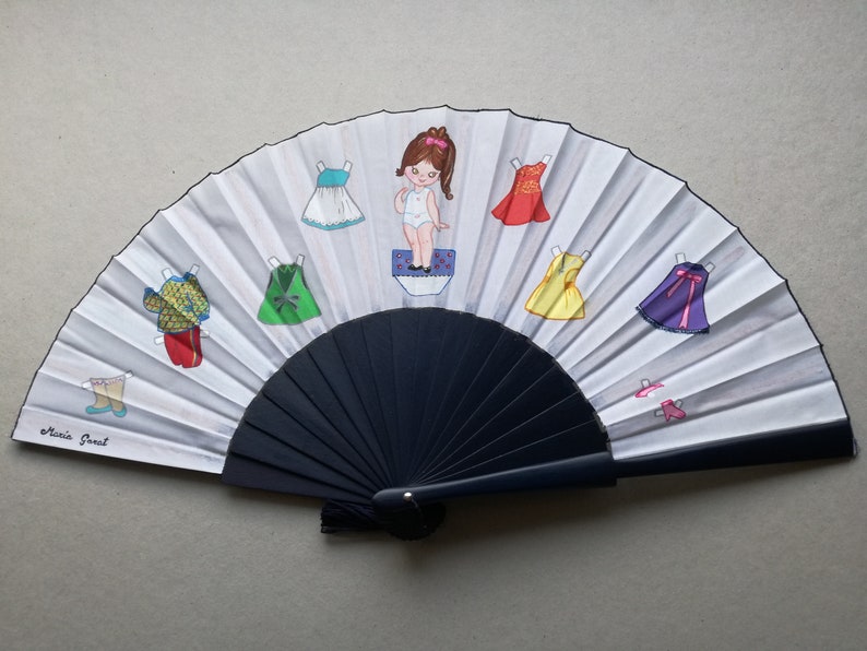 Handcrafted fan and cover. Handcrafted fan and cover.