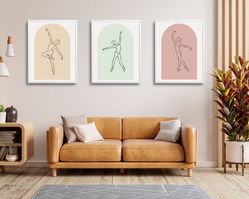 May include: Three framed line drawings of a ballerina in a single-line style. Each drawing is set against a different colored background: peach, light green, and pink.