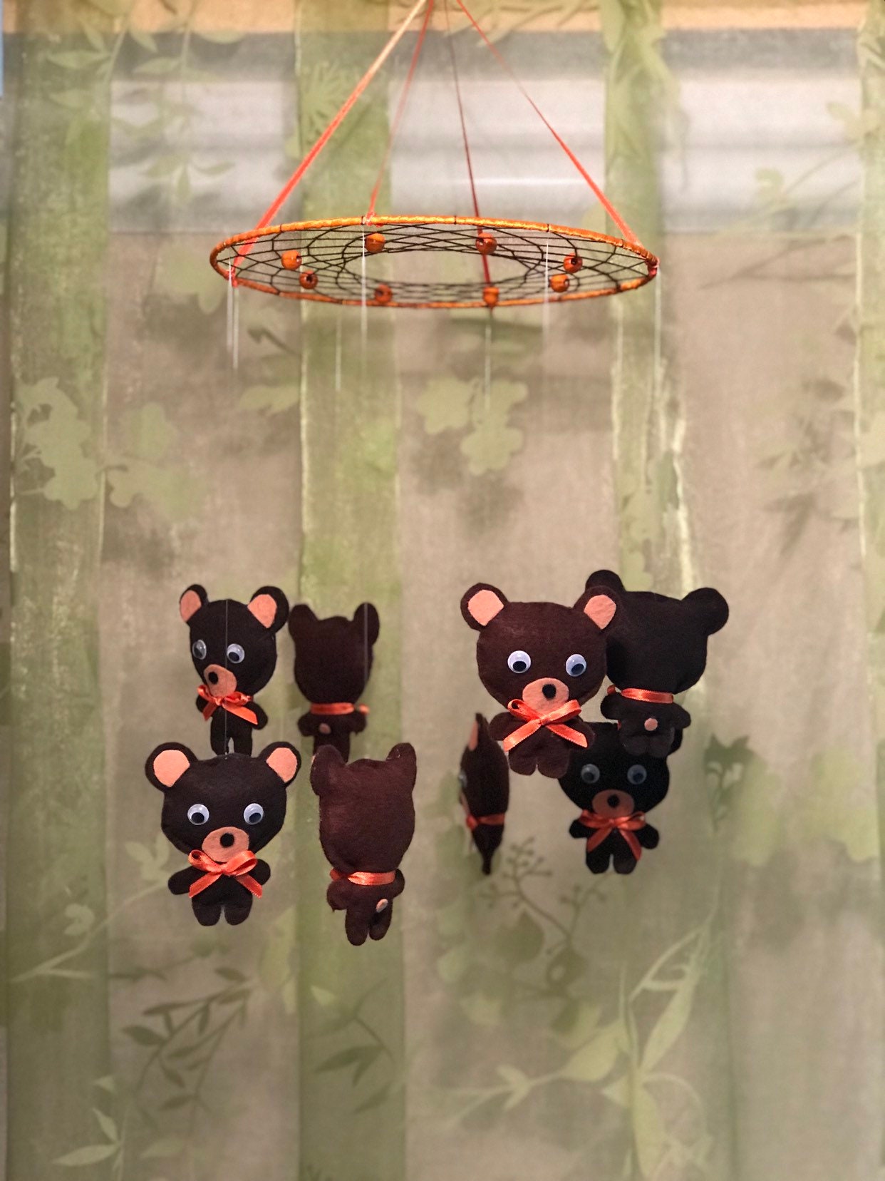 baby toy hanging above crib