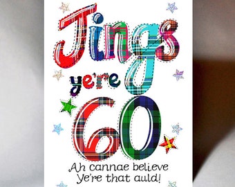 Op de afbeelding: Een kleurrijke verjaardagskaart met een geruit ontwerp. De kaart zegt "Jings ye're 60" en "Ah cannae believe ye're that auld!"