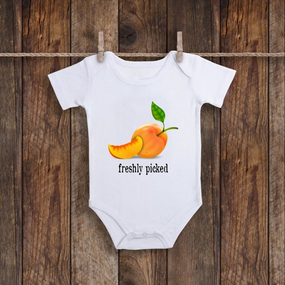 baby clothes with peaches