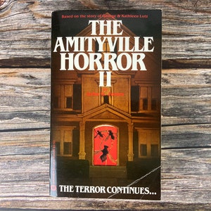 Amityville Horror II by John G. Jones - WarnerPaperback Horror Books - 1980s Paperback Books - Keyhole Cover Picture Window Cover