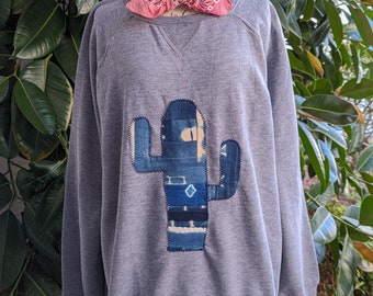 Sweatshirt with indigo cactus applique